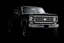 Placeholder: front corner 1973 Chevrolet square body truck 4x4 facing a little to the left, dark gray background, high contrast black and white vector