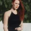 Placeholder: simone simons vocalist with poison ivy body