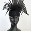 Placeholder: black raffia head piece