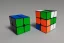 Placeholder: A single, tall Rubik cube vehicle, Orange, white, blue, green