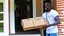 Placeholder: Tyrone suspiciously takes small delivered package from porch