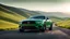 Placeholder: Cross between Ford mustang and bentley, on a road of green hills in morning