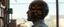Placeholder: we see through a mans transparent head and there is a room inside his head with a trader in it looking out the window