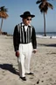 Placeholder: [hammer horror] Pugsley Addams on the beach in California [Versace]