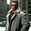 Placeholder: a young man with big muscles who looks like hans gruber wearing a heavy coat and red sunglasses staring with a disgusted look on his face