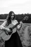 Placeholder: beautiful woman playing acoustic guitar in mid west blck and white old photto