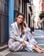 Placeholder: a supermodel in designer sleepwear sitting on street for magazine cover photoshoot