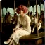 Placeholder: Clara bow, merry go round., in the wind, white lace dress, pink hair,autochrome