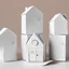 Placeholder: A picture of folded paper houses, the houses, clean and serene vibe. warm red background.