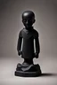 Placeholder: an ominous small statuette made of black stone, incomprehensible shape