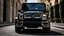 Placeholder: A (((G-Wagon Black))) featuring a luxurious interior, advanced technologies, and a sleek body kit designed by MANSORY, front cinematic view on road in morning, ((((desktop wallpaper))))