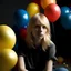 Placeholder: Melancholy blond woman covered with balloons