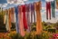 Placeholder: Beautiful lace pants of different colours drying on a clothesline in a flower garden, centre, bold colours elegant fantasy 8k beautiful dynamic lighting award winning imperial colors hyperrealistic ultra detailed 4K 3D high definition crisp quality colourful hdr, backlit, in sunshine