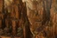 Placeholder: A brown canyon with cannons designed in medieval tapestry painted by Zhang Lu