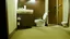 Placeholder: man urinates on the floor in his hotel room