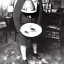 Placeholder: Creepy old photo flying saucer man