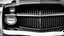 Placeholder: Photograph of a the front grill of a gorgeous, expensive, oldschool black muscle car with a big, black front grill, realistic, stylish, taken up close, symmetrical