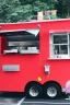 Placeholder: modern looking food truck that has a bunch of bright paint and flashy lights