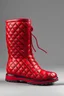 Placeholder: Red puffer boots with a grey embossed large grid pattern and a red sole