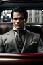 Placeholder: fictional henry cavill LOOKALIKE wearing suit LOOKING FROM BEHIND IN THE SEAT OF THE CAR, their backs are facing the camera, looking at the camera, safe. sfw, no explicit content. books