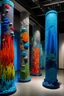 Placeholder: Install a series of towering textile pillars representing coral reefs, each adorned with Mandarin Fish motifs and marine life. These pillars can be arranged in a way that guides visitors through a pathway, simulating a dive through a coral reef.