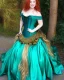 Placeholder: Magic princess with long auburn hair in a big teal green and gold satin ballgown corset off shoulder top casting magic