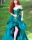 Placeholder: Magic princess with long auburn hair in a big teal green and gold satin ballgown corset off shoulder top casting magic