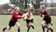 Placeholder: Young schoolgirls playing rugby, award-winning colour photograph