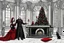 Placeholder: long shoot, gothic Christmas party, decadent, special, beautiful black festive and casual clothes, goth-style men and women talking, dancing, drinking champagne. gothic, luxury decor, fireplace, large gothic windows, red velvet with curtains, gothic christmas decoration, creepy beautiful, perfect focus, random background, hyper detailed, sharp focus, studio shot, intricate details, professional photo, detailed