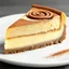 Placeholder: A decadent slice of cinnamon roll cheesecake, showcasing layers of creamy cheesecake filling and swirls of cinnamon-spiced pastry. The top is lightly browned and glistening. Served on a white plate, garnished with a sprinkle of cinnamon. Photorealistic style, high resolution, appetizing close-up shot.