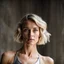 Placeholder: beautiful young woman, short grey metallic triathlon swimsuit, short blond wavy bob hair, blurred concrete background