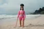Placeholder: [1960’s stop-motion animation style on the beach the overcast sky in the background] a 70s advertisement video TV featuring A surprised Nomadic samurai woman, 24-years-old wearing a pink one-piece swimsuit , poised on hands and knees as a claymation character toy from a claymation horror movie in burning rainbow land, from hell, creepy Videos, eyeballs and trees everywhere , as old advertisement shot on video VHS