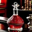 Placeholder: Create an illustration of an antique-style decanter with intricate crystal patterns. The decanter should be filled with a bright red liquid, reminiscent of fine wine. Capture the elegance and luxury of a bygone era.