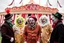 Placeholder: a group of clowns in front of the circus with a CNN logo