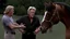 Placeholder: gary busey talking to a horse