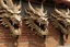 Placeholder: A brown wall fortress with dragon heads painted by Hashimoto Gaho