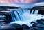 Placeholder: massive intimidating rock cliffs ascend all around and further up out of view. far below, the stormy ocean swirls intimidatingly. The ocean water falls off a waterfall down into a circular pit