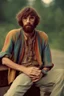 Placeholder: Hippie bohemian young man with Parisian bohemian look and glasses of colours and poor and short short short and poor hair on the head with receding hairline. Farsightedness glasses with big eyes. Long beard. Vintage look and feel like photo styleof the 70s