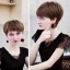 Placeholder: Russian boyish boylike female figure short man's haircut men's face boyish features in black girlish lacy cocktail dress earrings in restaurant