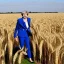 Placeholder: theresa may dressed as a robot, running through fields of wheat, sunshine, daytime