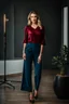 Placeholder: fullbody shot of young-beautiful-german girl-with-a-perfect-face-with-make-up-wearing- blue top and dark red pants standing , prophesional photography studio