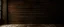 Placeholder: horizontal wooden planks painted dark brown, no gaps