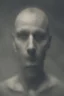Placeholder: a blurry, distressing, haunting image of a man's fracturing mind