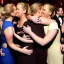 Placeholder: brie larson hugging amy schumer, jennifer lawrence kissing Queen Elizabeth, photo
