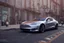 Placeholder: A Tesla 'Model S' is parked, on the streets of San Francisco. (CINEMATIC, WIDE ANGLE LENS, PHOTO REAL)