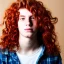 Placeholder: teen, male, with long red curly hair, real photo, soft lighting