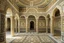 Placeholder: A beige monastery in a tornado designed in ancient Greek mosaics