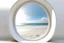 Placeholder: white,background,looking,through,a 3-d, hole,or,window,,a,seeing,paraddise,beach ,skulpture,like