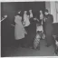 Placeholder: Creepy old photo of new years eve party with monster cat