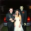 Placeholder: Teenage Frankenstein and teenage bride of Frankenstein as awkward teenagers in prom attire posing for an uncomfortable picture in front of a limo, forced smiles, grainy amateur photograph, corsage, hyperrealism, sinister, heavy atmosphere, background a suburban front lawn